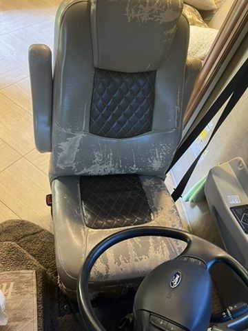 RV captain's chair before reupholstery, worn and cracked